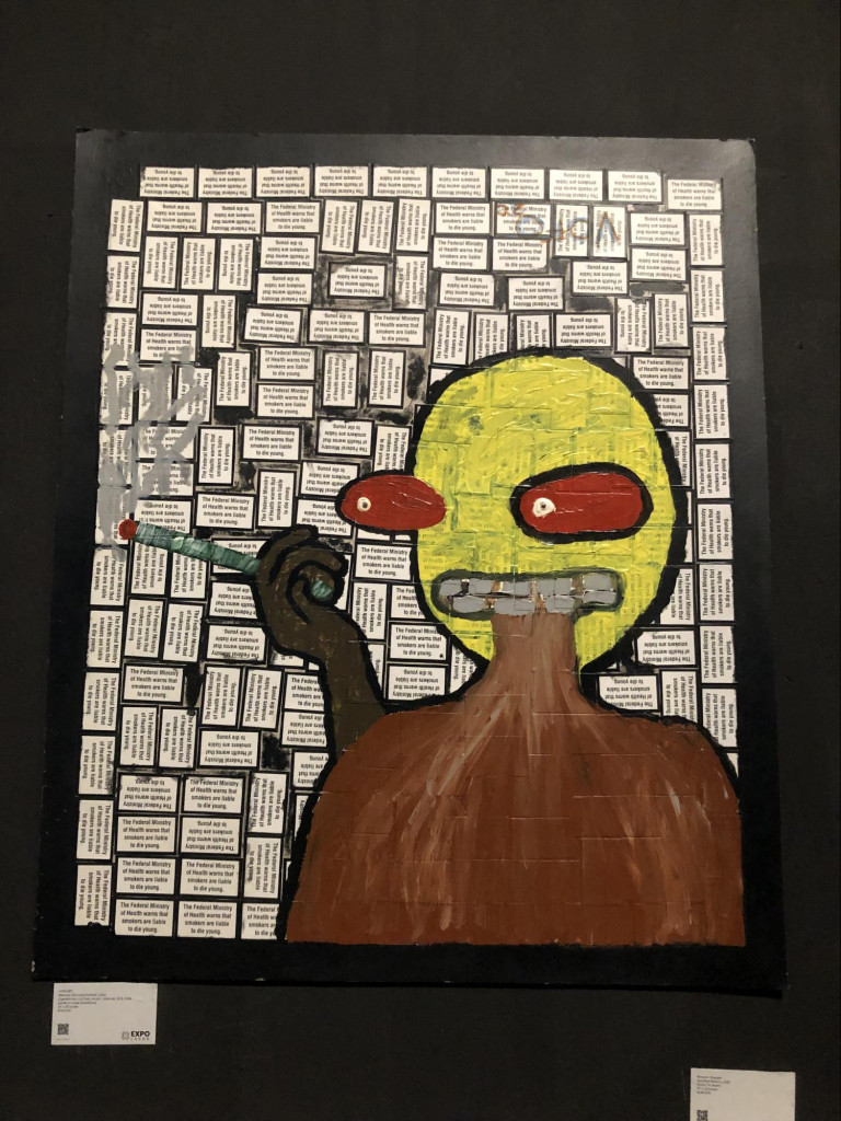 Mementor Mori by Vanessa Ofomata. Medium: Cigarette box cut outs, arcylic, charcoal, oil & chalk pastel on large strawboard.