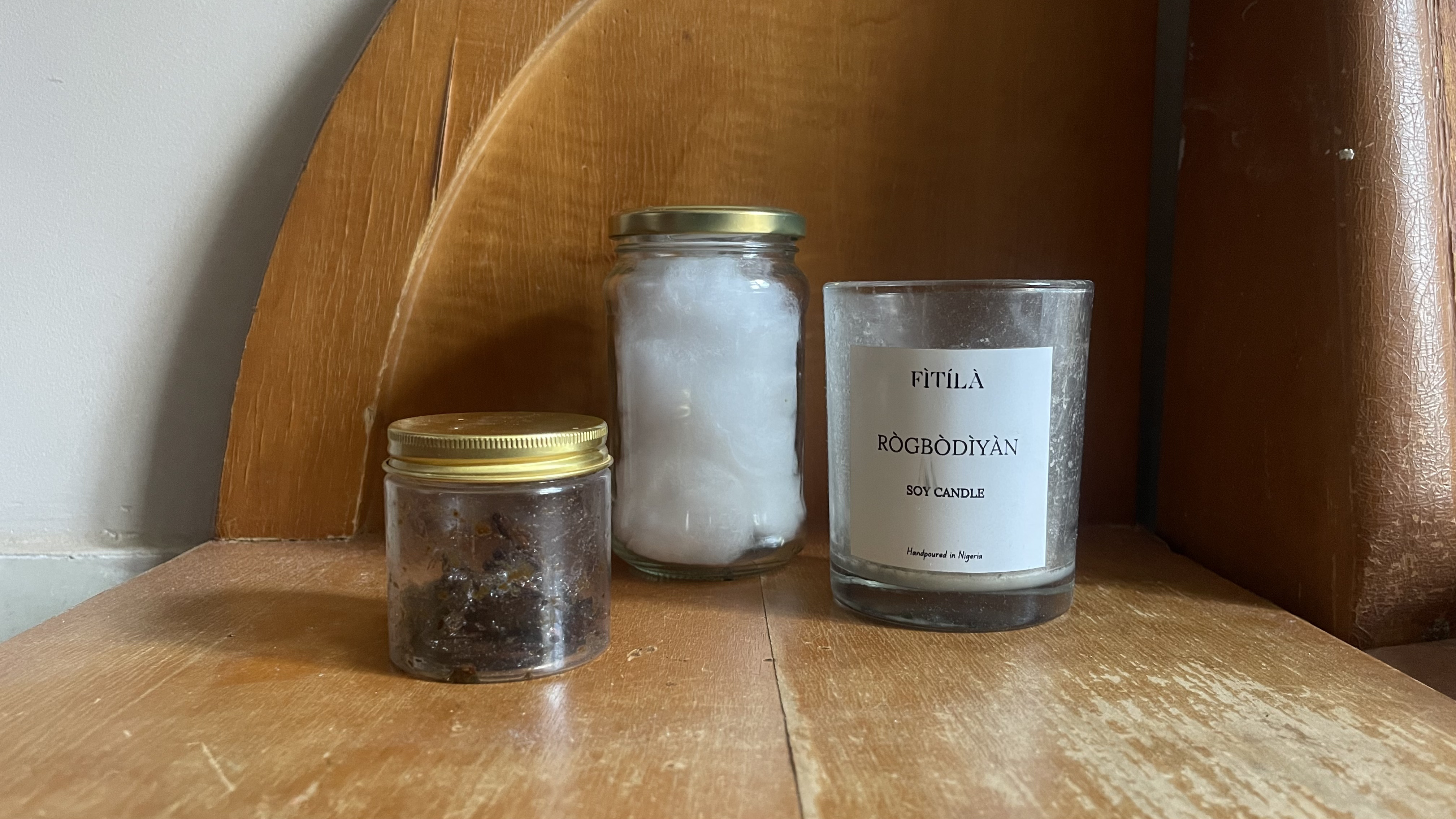 Upcycle: Old jam jars turned into a cotton wool holder and a container for Turare wuta (incense), with an old candle glass serving as its chamber.