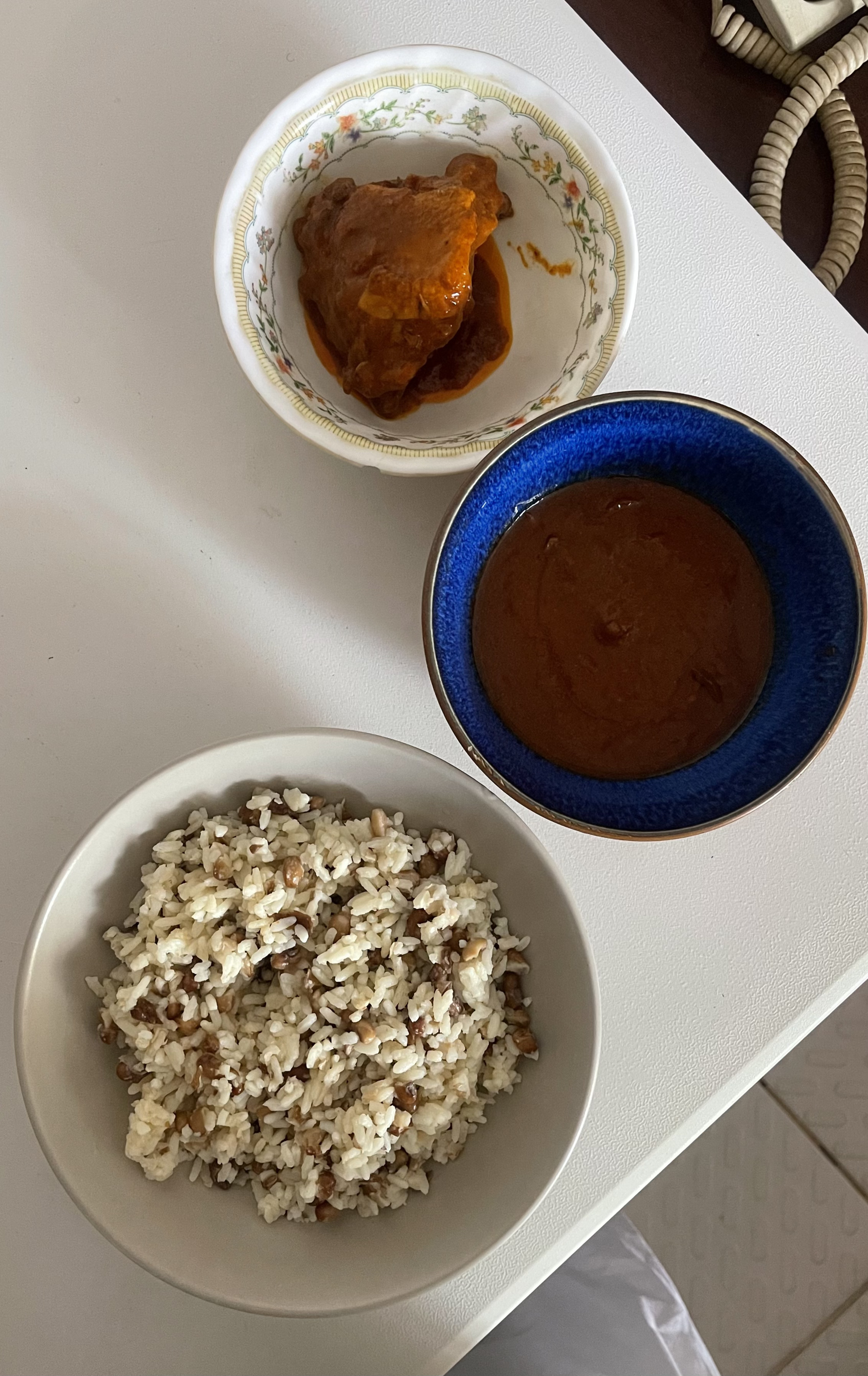 Elegantly plated rice and beans with beef stew